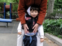 Samuel Habib, 3, walks with his mother, Betsy McNamara, during a trip to NYC.    Dan Habib photo