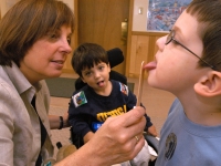 Samuel Habib, 3, has a speech therapy session with therapist Barbara Jobin, left, and classmate Zachary Faretra.    Dan Habib photo