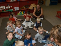 Samuel shows off his new g-tube during his first day back at preschool after surgery at Shaker Road School, 8/25/03.  (Concord Monitor photo/Dan Habib)