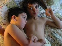 Samuel and Isaiah lie together after a bath.  Dan Habib photo