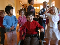 Samuel celebrates his 5th birthday with friends during a treature hunt.  Dan Habib photo