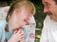 Alana Malfy visits with a relative at her 17th birthday party at her family's Pembroke, New Hampshire, home.   (Concord Monitor photo/Dan Habib)