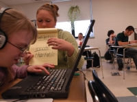 Academic supports, like a laptop, headphones and word prompts, are critical to Alana's success in regular classes.   Dan Habib photo