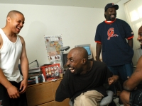 On the morning of his wedding, Keith Jones laughs with groomsmen in his Somerville, Massachusetts, apartment.   Dan Habib photo